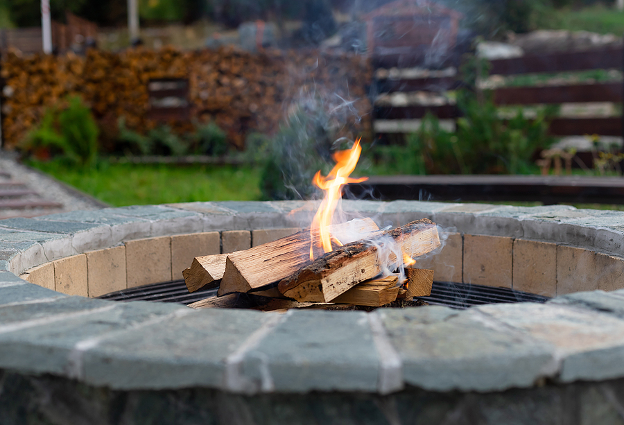 How to Enjoy a Backyard Fire Pit Safely - City Building Owners Insurance