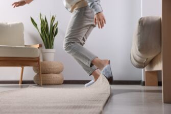 Homeowner tipping over a rug represents a typical slip, trip and and fall risk