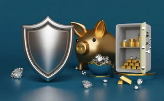 Gold piggy bank, open safe with gold bars and scattered jewelry to illustrate high value items that should be insured.