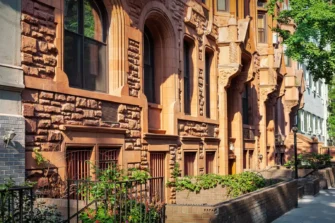Save on insurance for NYC brownstones, like those shown here.