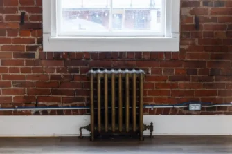 Radiator under window for heat
